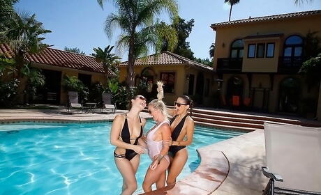 Stunning women Ainsley Addison, Celeste Star and Dani Daniels have a passionate lesbian foreplay near the pool