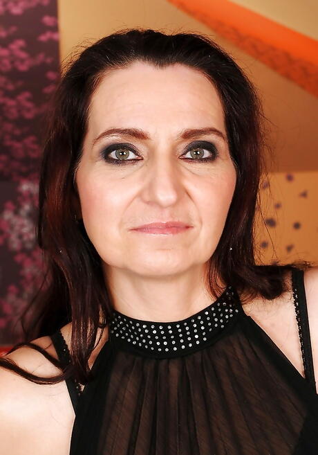 Very attractive granny Liza Bird in hot undies baring her ass and hairy pussy 