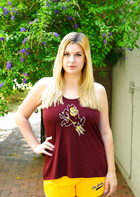 Facinating blonde babe Danielle Delaunay in sexy shorts in foot fetish show outside